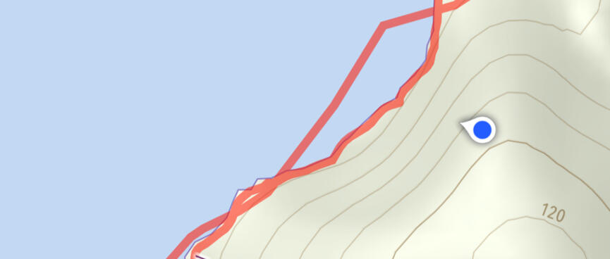 A screenshot from the iPhone app MapOut, showing the topography of the surrounding hills with colours and shading.
