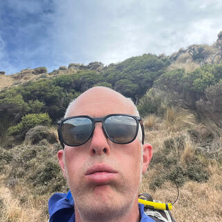 Making an exhausted face halfway up a hill.