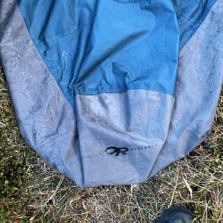 Droplets of water on the exterior of an Outdoor Research bivvy sack.