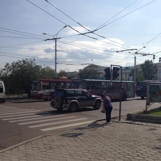 Trolley buses are powered by overhead wires, in Chita.