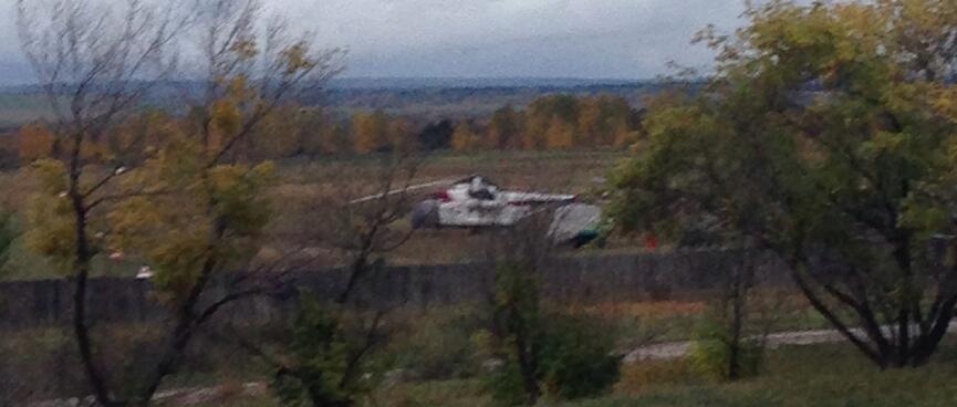 At the Oyok Airfield, a large white helicopter looks like the Sikorsky S-58T used in the TV Series Riptide.