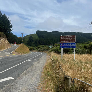 A sign marks the turnoff to West Wind Recreation Area, where one can walk, sight-see, mountain-bike and park.