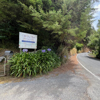 A sign for The Dog Bach boarding kennels.