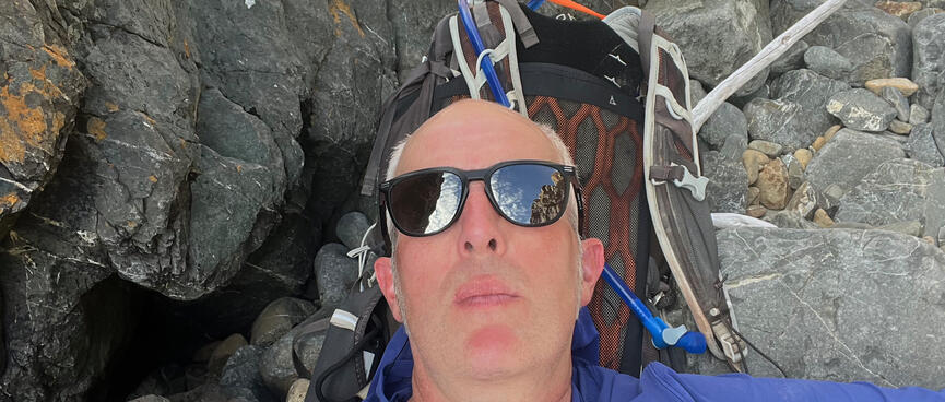 Lying down on rocks, using my pack for a pillow.
