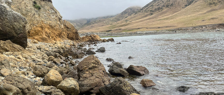 A rocky coastline with limited walking space.