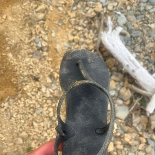A dirty black jandal.