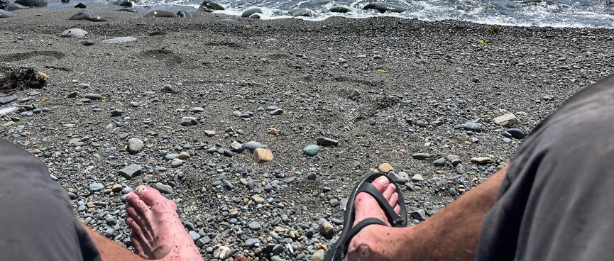 Wet legs and feet near the waterline.