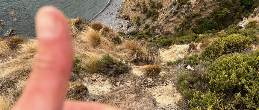 Giving a thumbs-up at the top of a hill.