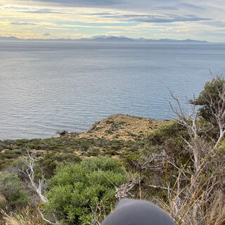 Looking out over a plateau to the sea beyond.