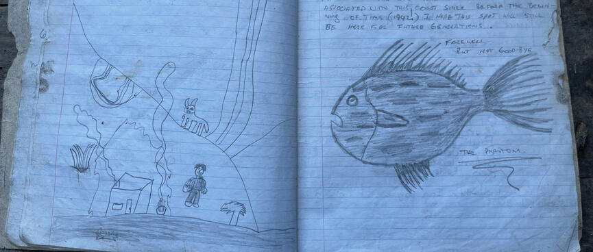 A pencil sketch by JoeL Denison depicting a fire outside the cave, and a sketch of a fish named ʼThe Phantomʼ.