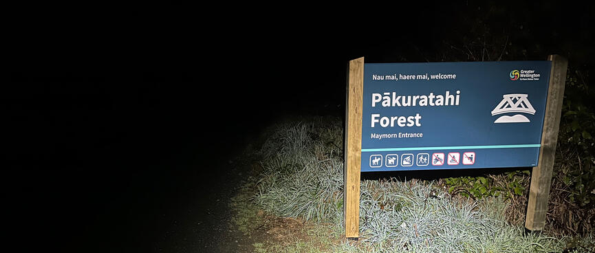 A blue and white sign for Pākuratahi Forest, Maymorn Entrance.