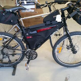 Surly Troll fitted with handlebar, frame and seat packs.