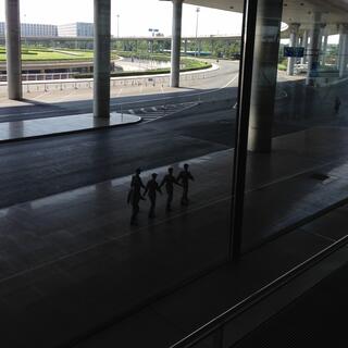 Five soldiers march in single file.