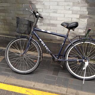 A simple black bicycle reads ʼPoliceʼ.