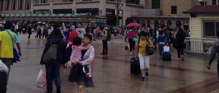Travellers with their bags.