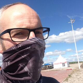 I wear a Buff brand scarf over my mouth and nose.