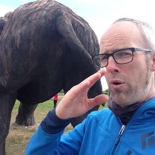 I wave away a smell at the mammothʼs rear end.