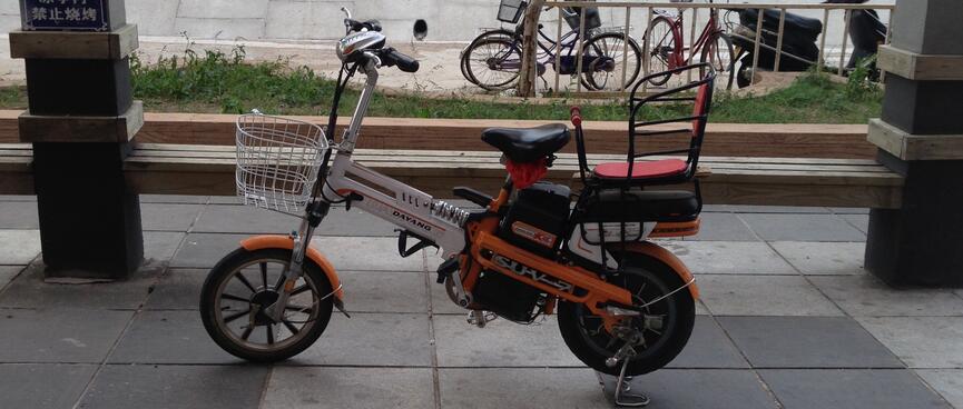 An electric scooter looks like a trigger happy pistol.