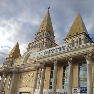Steeples adorn the roof of the local bank.