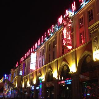 Red LED lettering on top of the local shopping center.