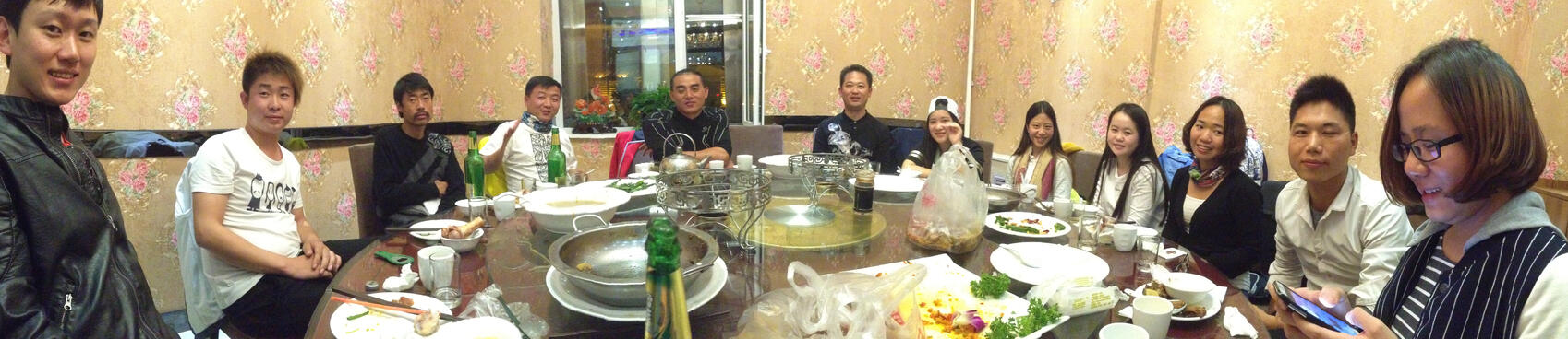 The thirteen of us seated around the table.