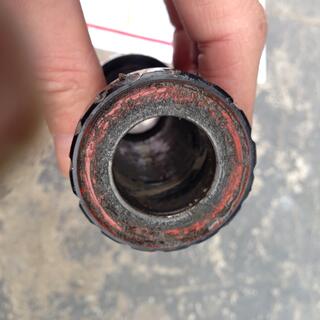 The dirty side of a seal from the Surly bottom bracket, due to water leakage.