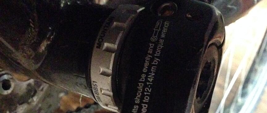 The crank arm and freshly installed Shimano bottom bracket.