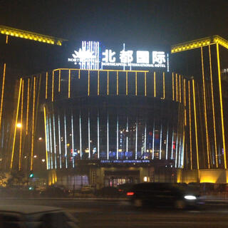 LED animations cover the front of the North Capital International Hotel.