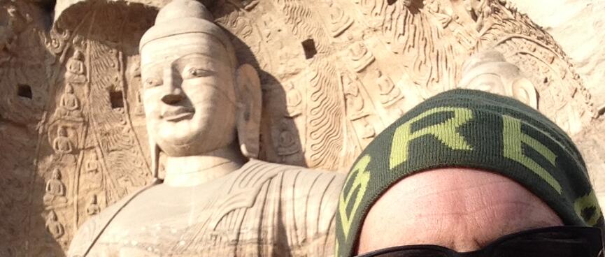 Selfie with a huge seated buddha.