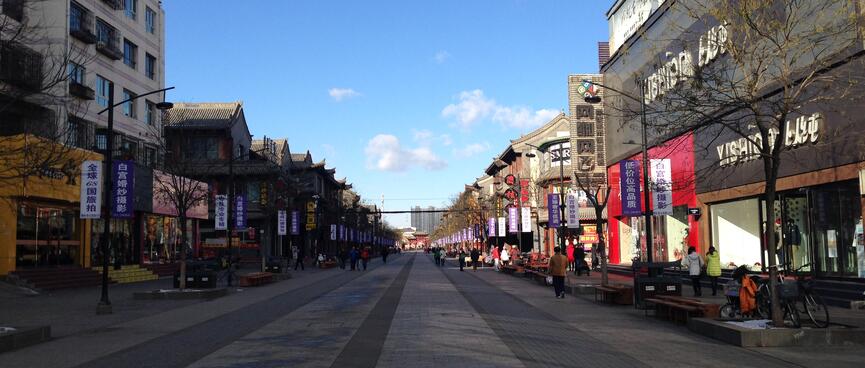 Modern department stores face off against traditional shops.
