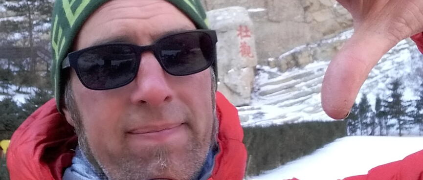 I give the thumbs down to show my disappointment at not being able to visit the temple in the background.