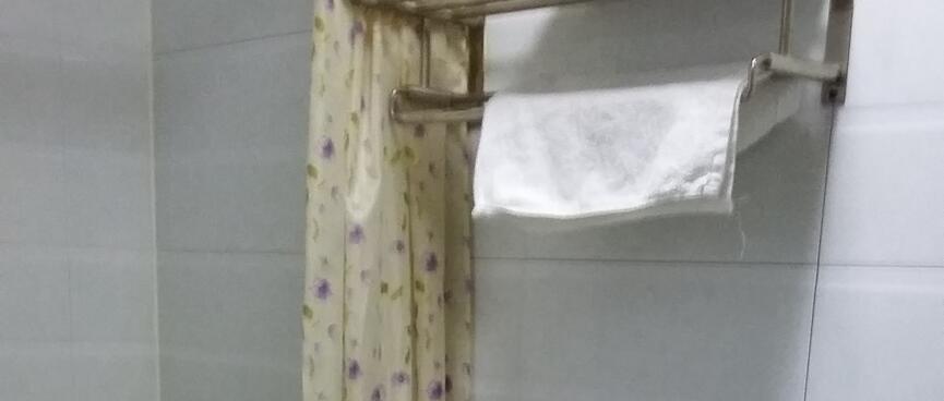 Bathroom hotel and shower.