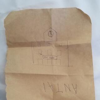 A simply pen drawing of a building with the words ANTAI and AH TAN.