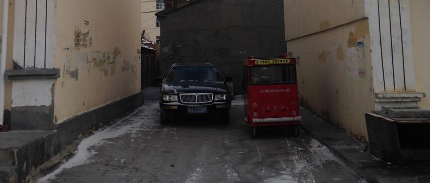 A small box-like truck.