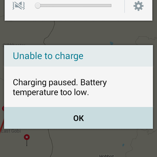 A screenshot from an Android phone shows a battery level of 6% and the message 'Unable to charge. Charging paused. Battery temperature too low.'