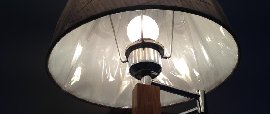 Clear plastic lines an illuminated lampshade.
