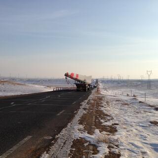 The truck continues on down the road.