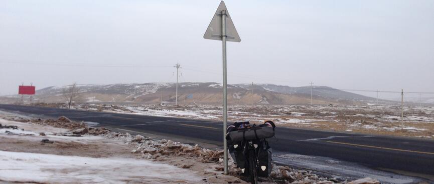 Low hills, snow and mud.