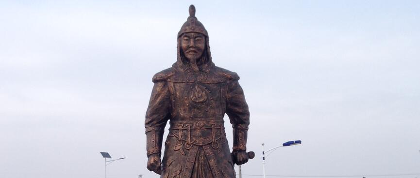 A metal soldier stands guard outside the exhibits.
