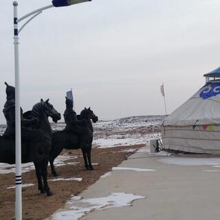 Statues of soldiers on horseback.