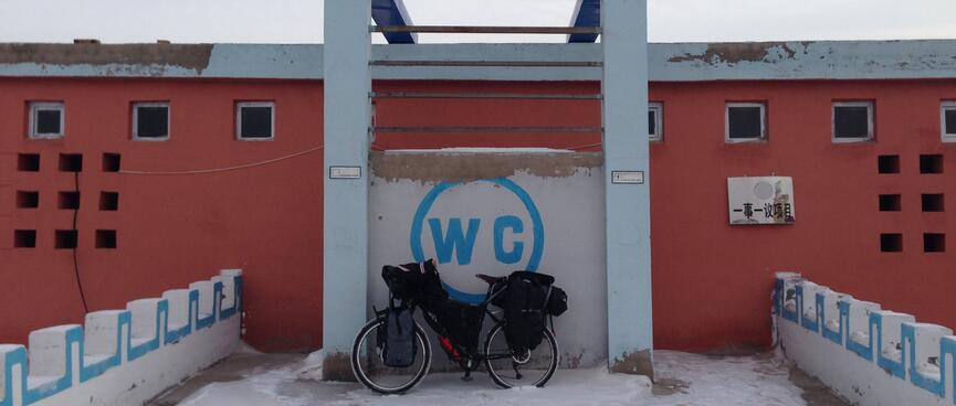 Blue lettering reading WC.