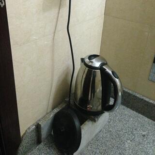 A metal hot water jug.