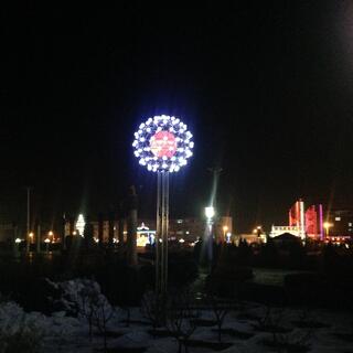 Dome with a red center surrounded by white lights.