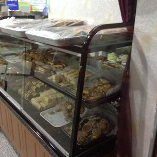 Sweet treats in a glass cabinet.