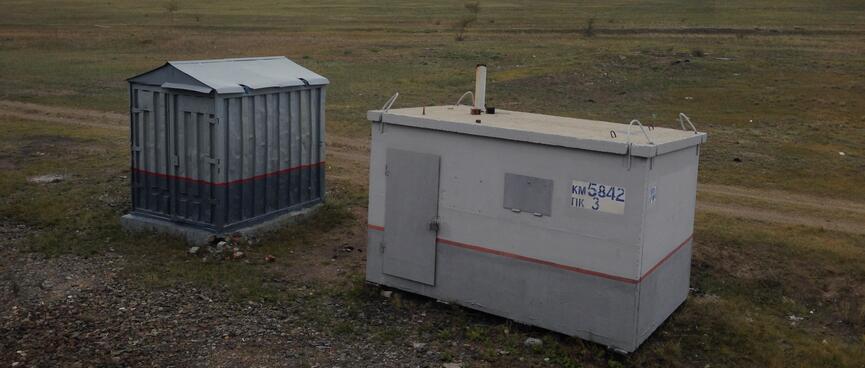 Small grey sheds.