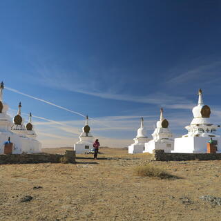 Squat white stone monuments topped with pointed domes.