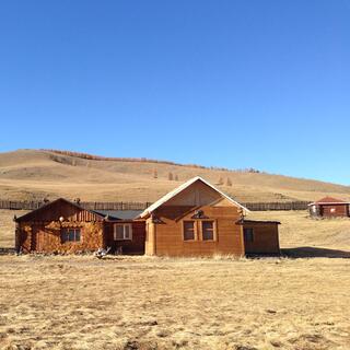 Brown log houses.