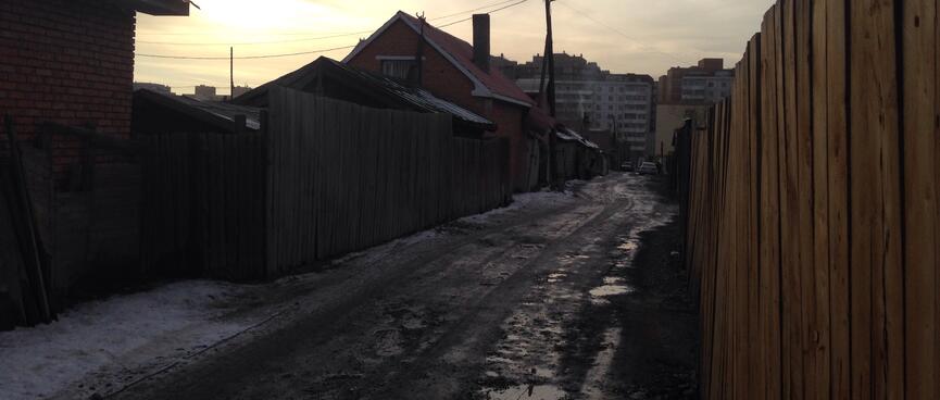 Strips of snow and ice in the alleyway behind the hostel.