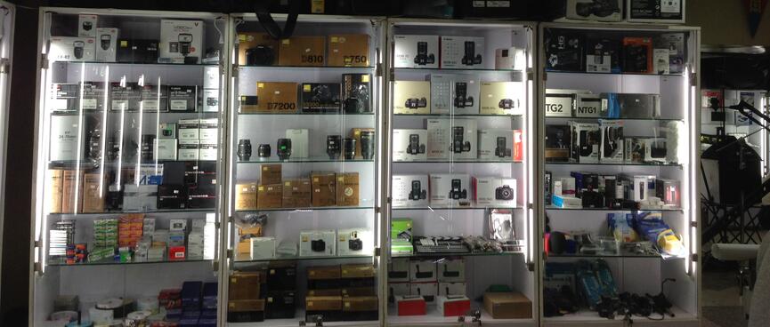 Tall backlit cabinets full of expensive electronics.