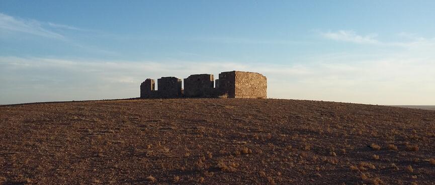 A roofless building with window holes looks like a set of teeth.
